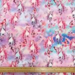 Cotton Jersey Mythical Unicorns on Pink Cloudy
