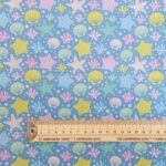 Starfish on Blue Polycotton