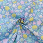Starfish on Blue Polycotton