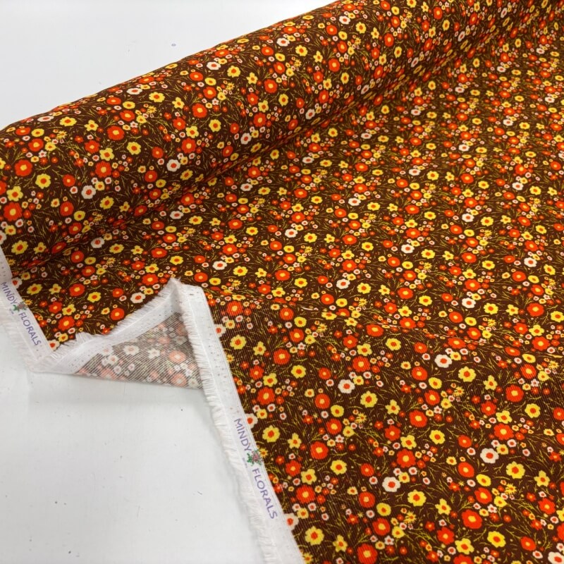 Image of Retro Orange Flowers Baby Cord