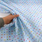 Multicoloured Stars on Blue Polycotton